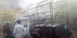 The remains of a burned-out truck driven by Chilón, Chiapas, mayoral candidate Pedro Gutiérrez.