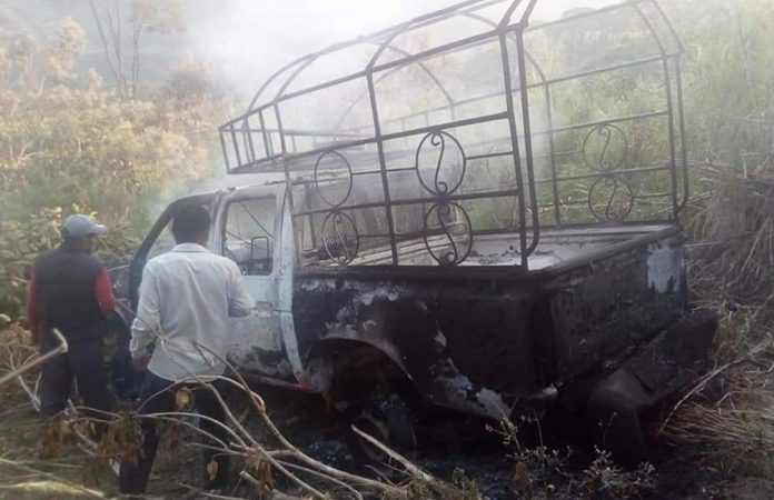 The remains of a burned-out truck driven by Chilón, Chiapas, mayoral candidate Pedro Gutiérrez.