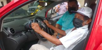 Don Nico in his new Chevrolet Beat.