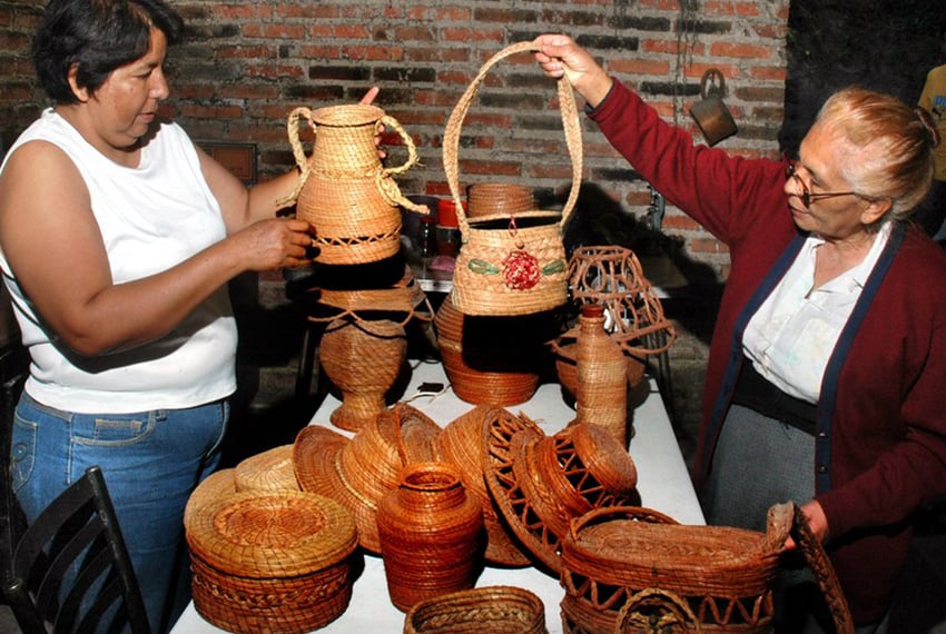 Marina Bañuelos with her pine-needle artisan items