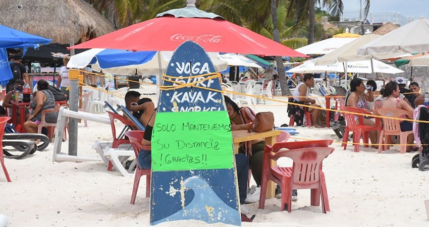 Guests on a Cancún beach restaurant in late May 2021