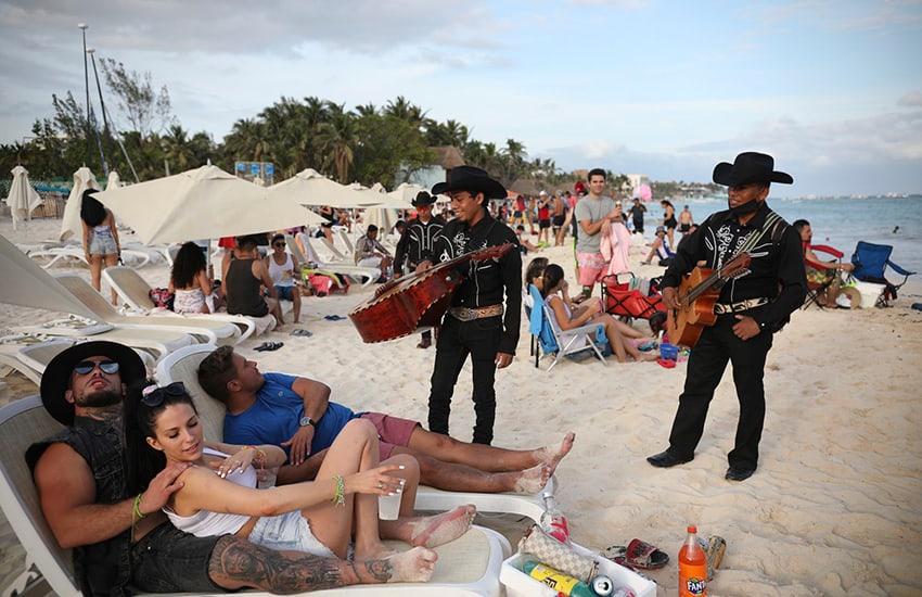 tourists on Playa del Carmen beach