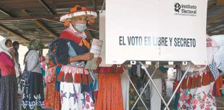 Tzotzil man in Chiapas preparing to vote