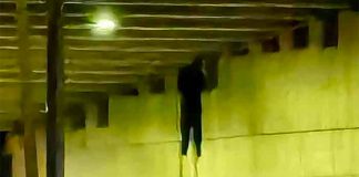 One of two bodies left hanging beneath an overpass Wednesday morning.