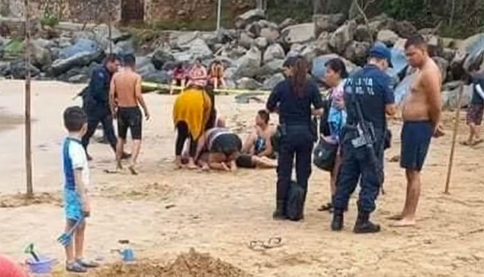 Rescue workers attempt to resuscitate the victim at Chacala beach.