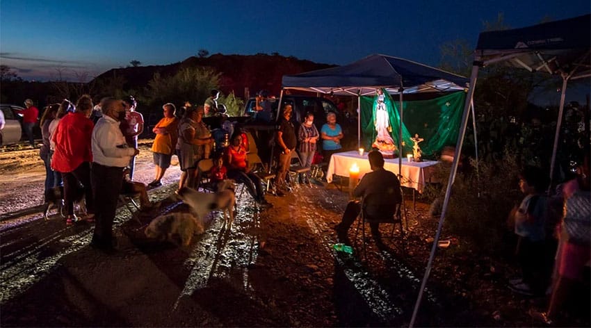 Miners' families conduct a vigil