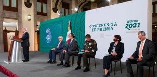 Five ministers await their turn to report at Tuesday's press conference