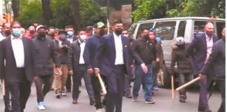 dissident party members march on PRI headquarters in Mexico City.