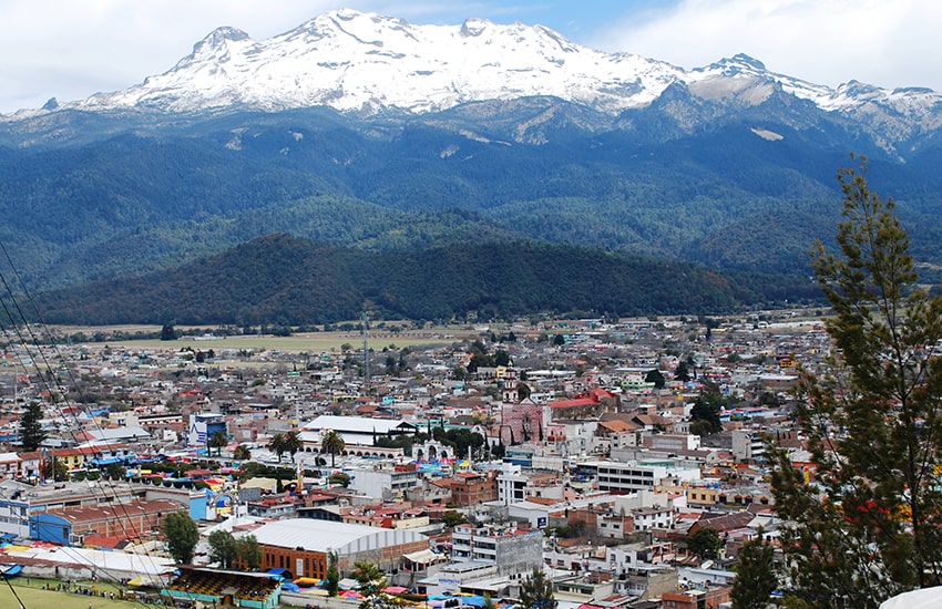 Panoramic of Amecameca with Iztaccihuatl volcano in the background