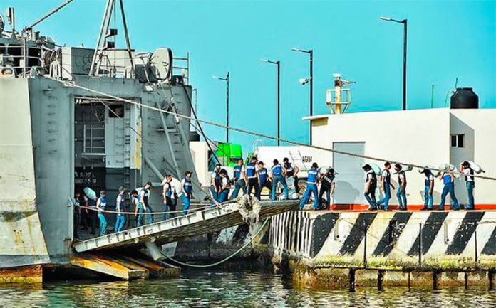 Supplies are loaded aboard a Mexican navy ship bound for Cuba.