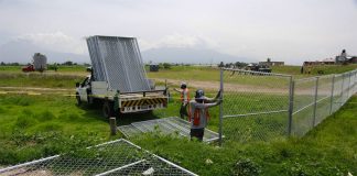 A fence is erected around Puebla's famous hole in the ground.