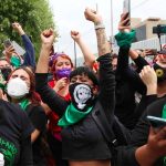 Women celebrate Wednesday's vote in Hidalgo.