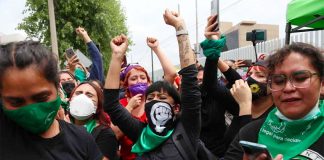 Women celebrate Wednesday's vote in Hidalgo.