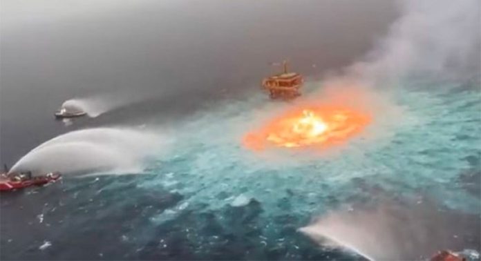Gas burns on the ocean surface in the Gulf of Mexico on Friday.