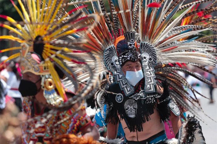 Colorful costumes adorned the capital's zócalo on Monday.