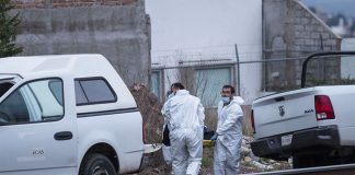 Forensic personnel recover two bodies Thursday in Zacatecas.