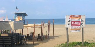 A quiet beach in Oaxaca, closed by coronavirus.