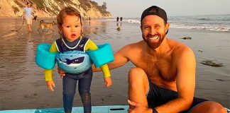 Surfing instructor Coleman with his son.
