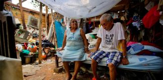 Hipólito Serna and Yolanda García in their roofless home in Poza Rica.