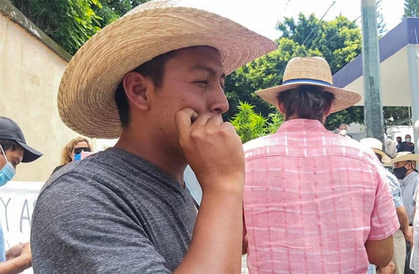 One of the people at the gathering in the Morelos capital tokes up in support of their campaign.