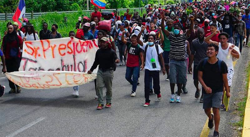 Migrants leave Tapachula Saturday morning.
