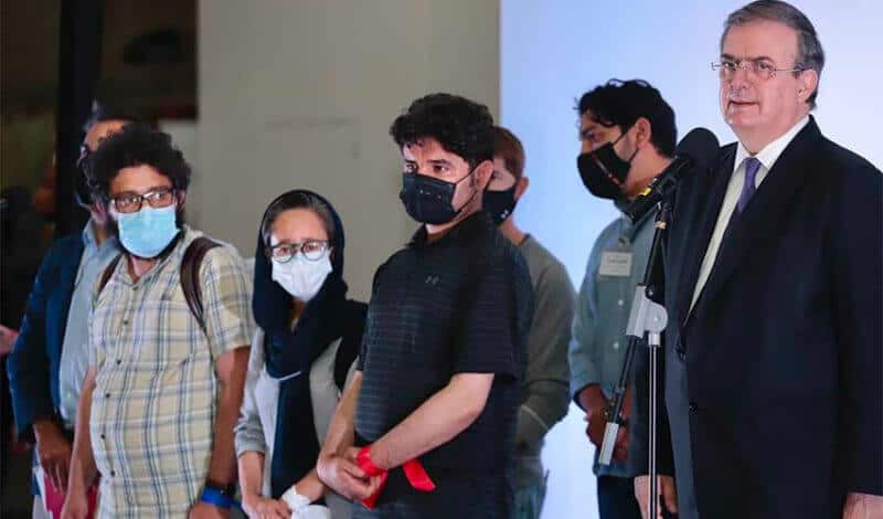 Some of the journalists and their families arrive in Mexico City.