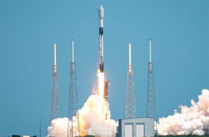 A SpaceX Falcon rocket lifts off at Cape Canaveral Space Force Station