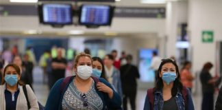 travelers at Mexico City airport.