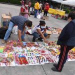 artisan vendors at Cholula tianguis displaying wares