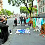 Opponents gather Monday outside the Supreme Court in Mexico City.