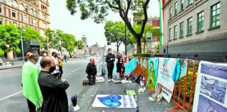 Opponents gather Monday outside the Supreme Court in Mexico City.