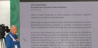 López Obrador reads his letter to reporters on Monday.