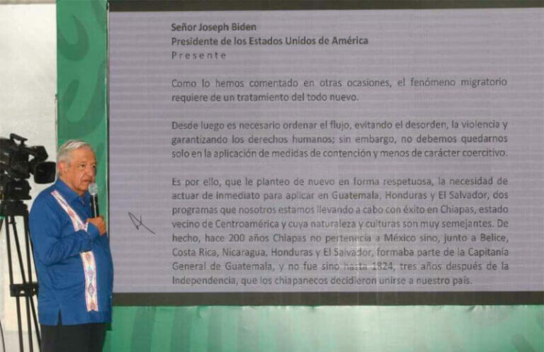López Obrador reads his letter to reporters on Monday.