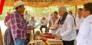 The president meets with Yaqui representatives last August in Sonora.