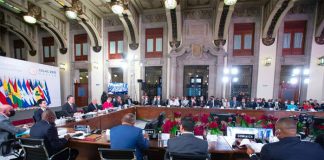 Latin American and Caribbean leaders at Saturday's conference at the National Palace.