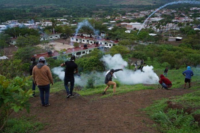 In July of this year, Aguililla residents threw firecrackers and rocks at the local military base to demand that authorities take action.
