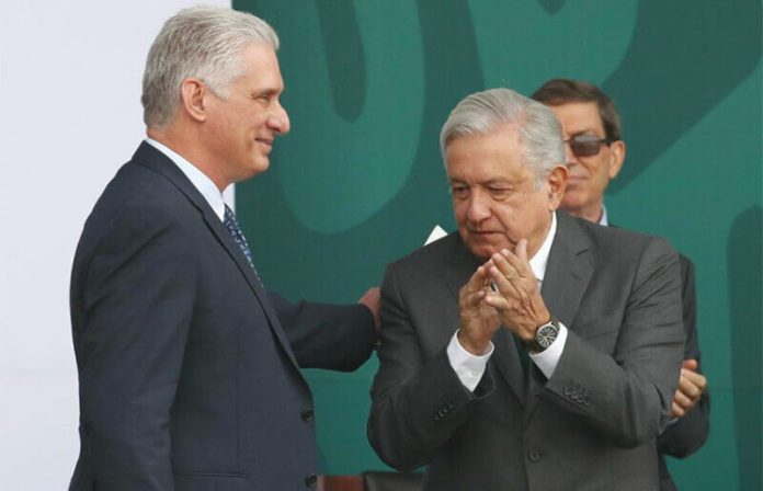 López Obrador applauds Cuba President Díaz-Canel during Independence celebrations on Thursday.