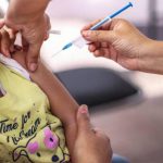 A young child receives a measles shot. Soon, children with certain health conditions will also be eligible for COVID-19 inoculations.