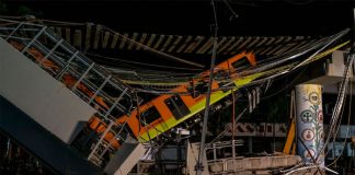 Firefighters and Civil Protection personnel work at the site of the Mexico City metro accident in May.