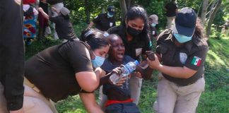 Immigration agents drag a screaming youngster out of the woods in Chiapas on Thursday.