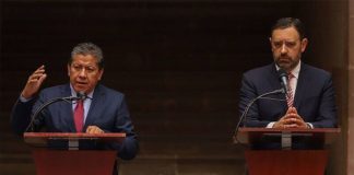 Zacatecas former governor Alejandro Tello and current governor David Monreal speak at a press conference in July, before the transition of power.