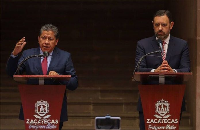 Zacatecas former governor Alejandro Tello and current governor David Monreal speak at a press conference in July, before the transition of power.