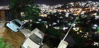 Two vehicles were left in a precarious position