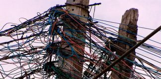 Some suspicious-looking connections on utility poles in Mexico City.