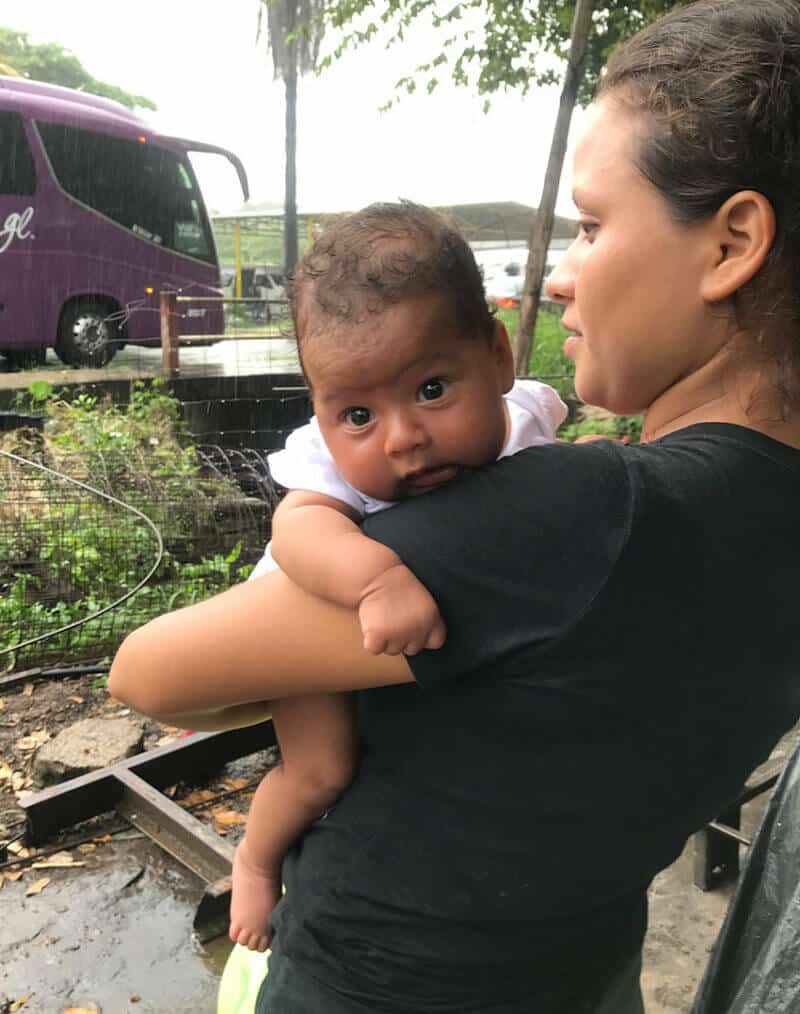 A well-traveled 3-month old baby and mother from Honduras.