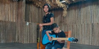 Young musicians on stage at El Tecolote.