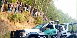 One of the police vehicles damaged during a standoff over a drone.