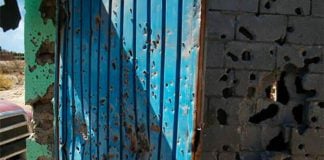 bullet holes in a wall