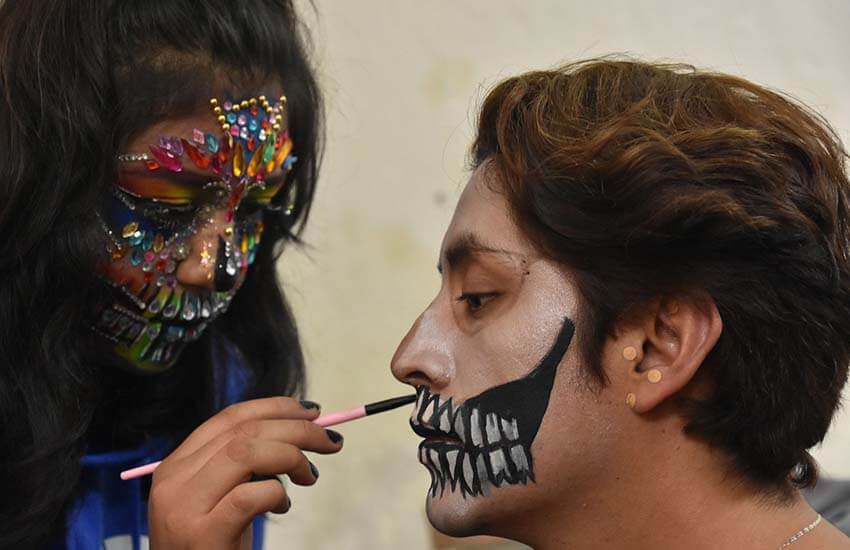 Day of the Dead Catrina face painting in Puebla city