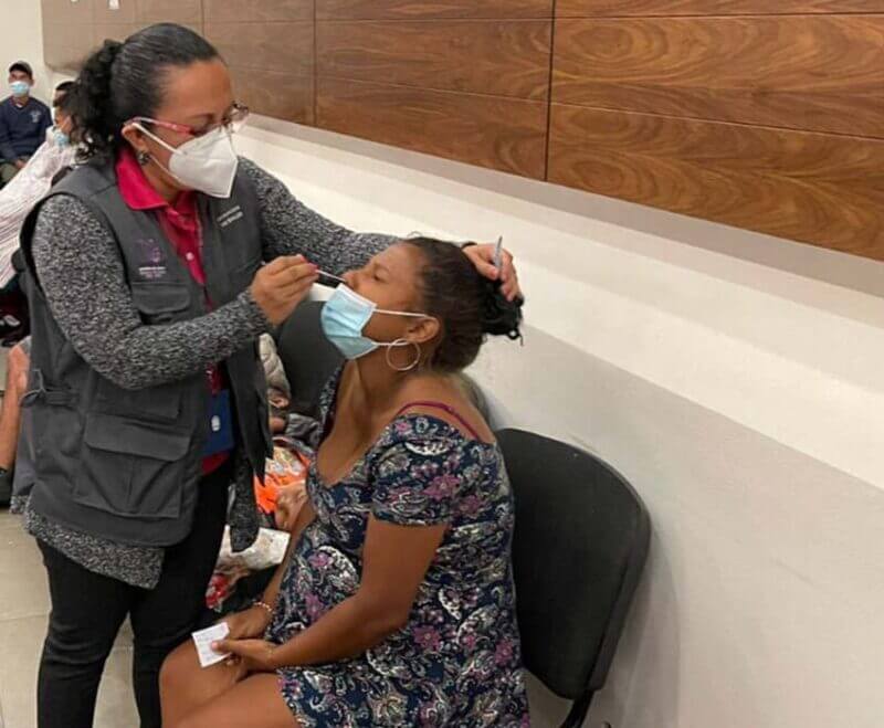 migrant getting medical testing